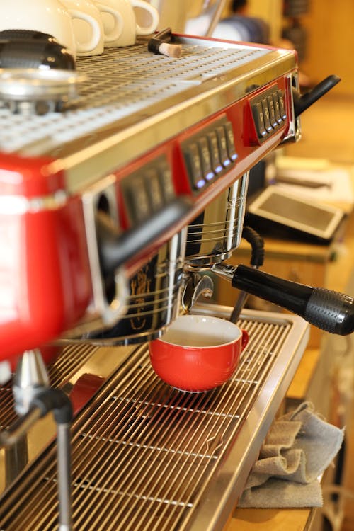 A Red Cup on Espresso Machine