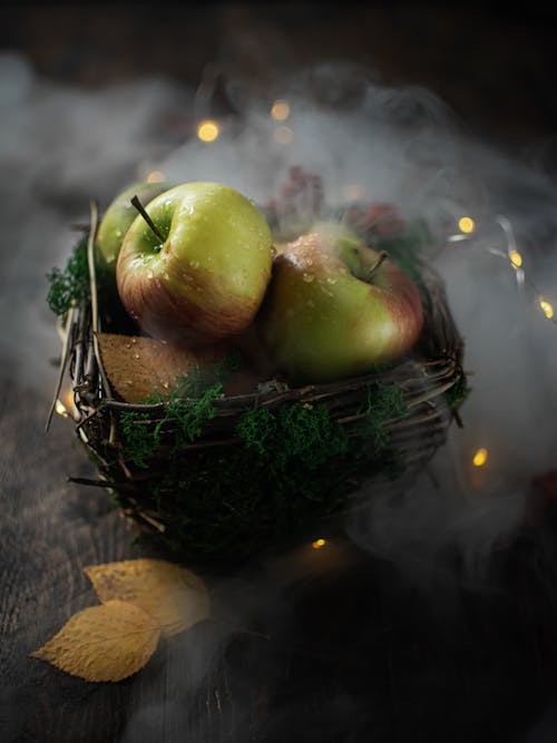 Green Apples in a Woven Basket