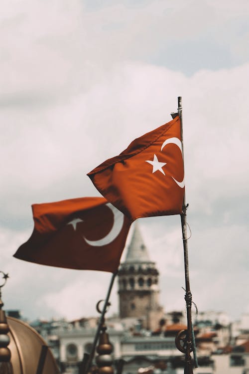 Free Flags of Turkey Hanging on Pole Stock Photo