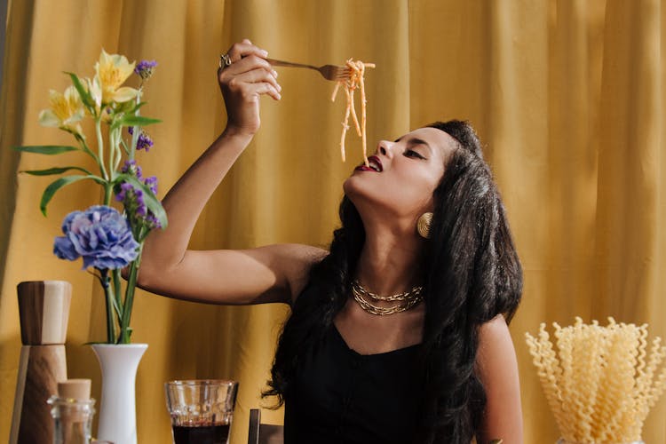 Woman Eating Spaghetti Bolognese