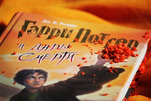 Foto profissional grátis de fundos laranja, harry potter, livro infantil