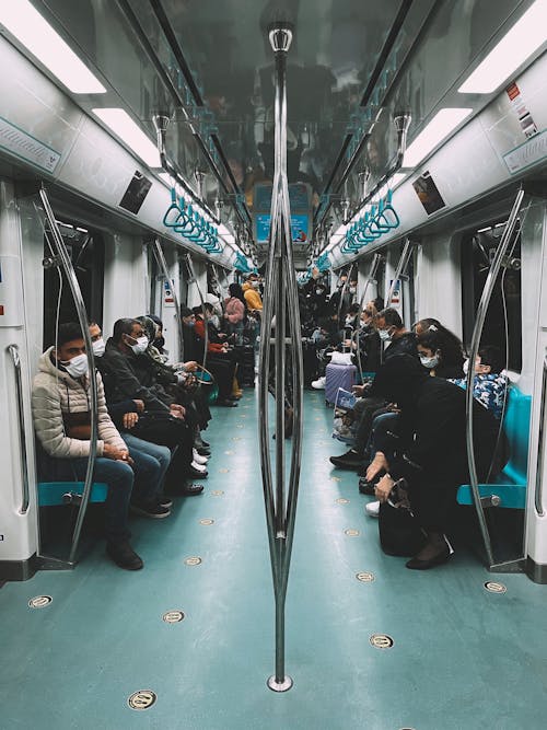 People Sitting on Train Seat