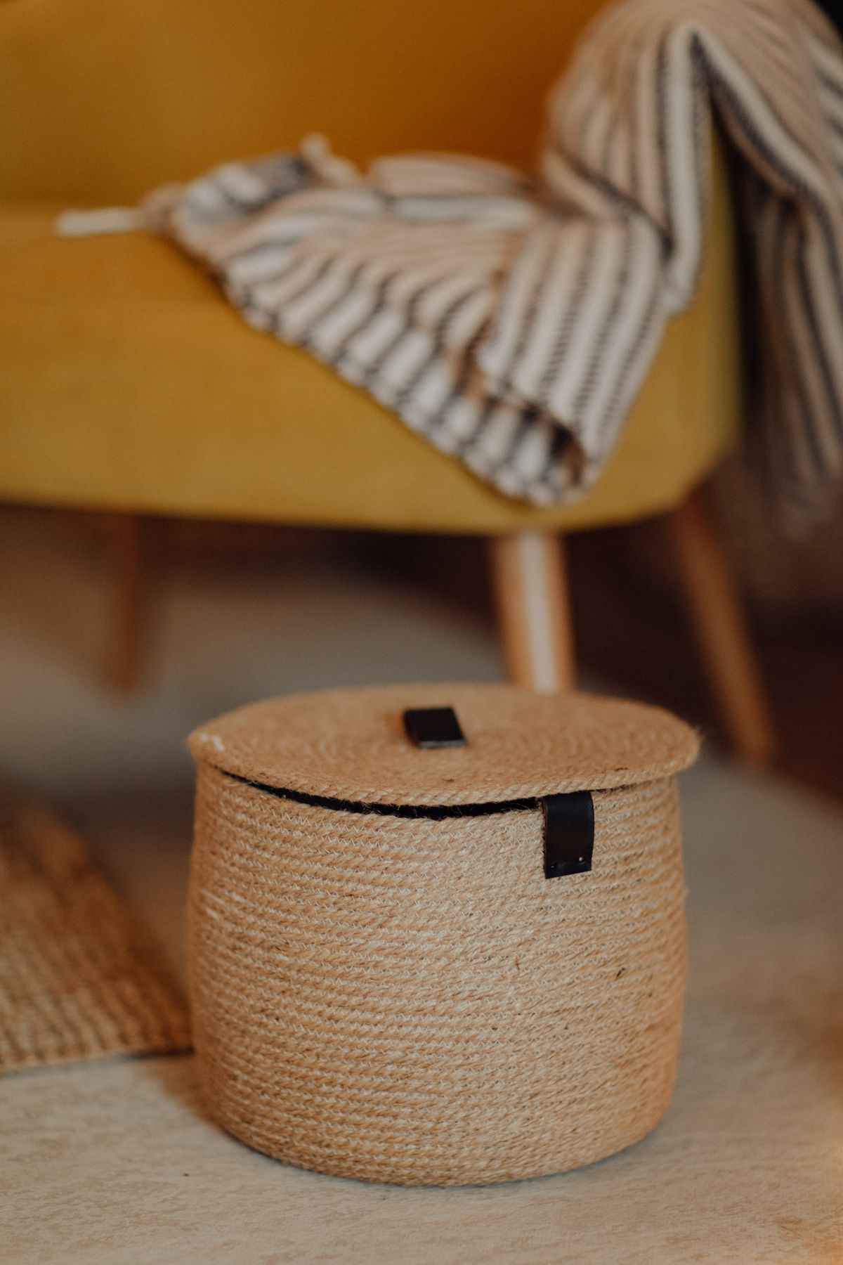 Handmade round woven basket with a lid