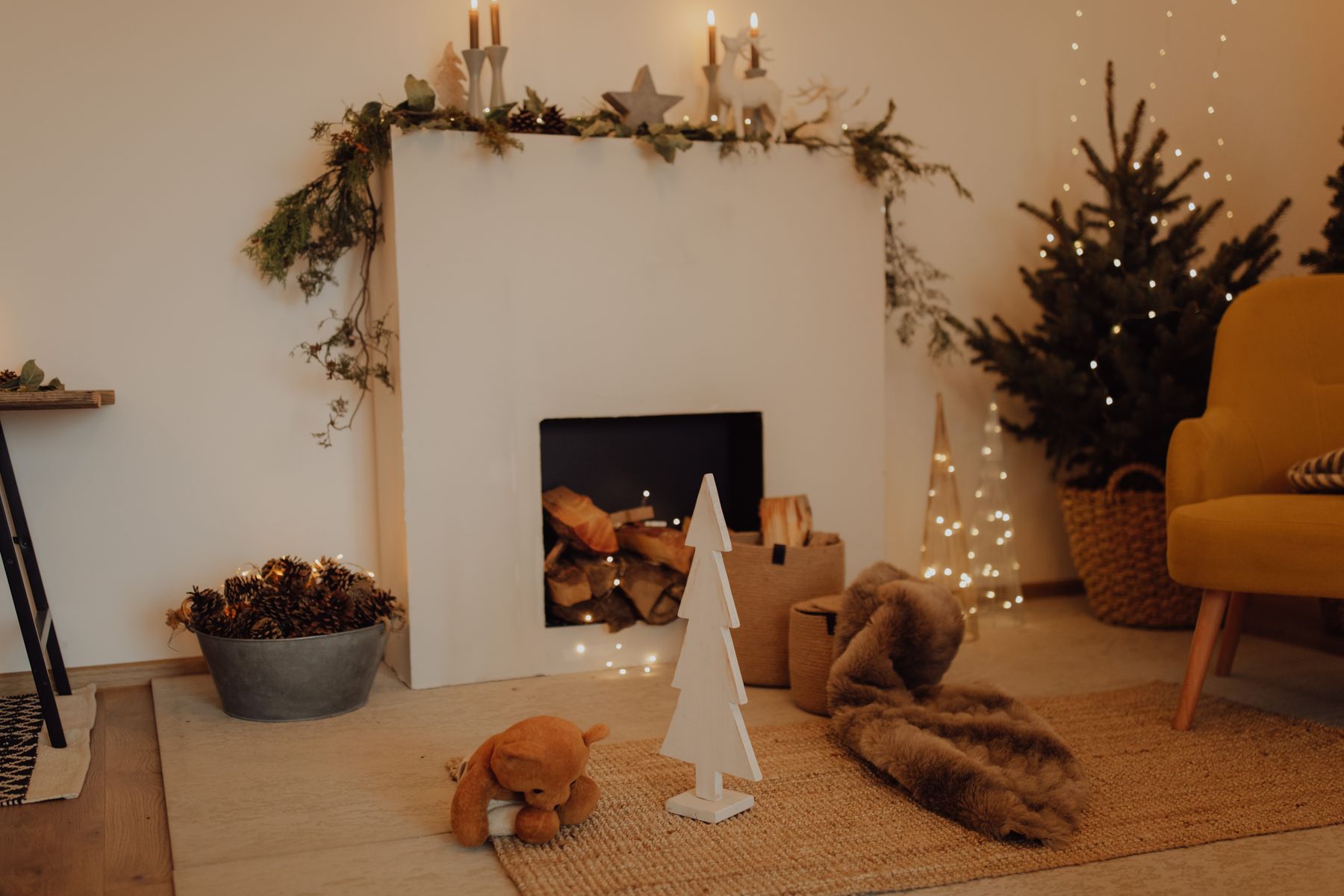 Christmas greenery and warm accents repeated through a home