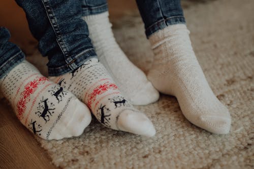Close-up of People in White Socks