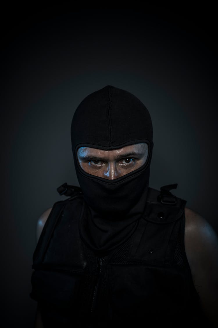 Man Wearing Black Balaclava And Bulletproof Vest