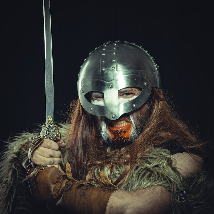 Viking In Mask And Sword