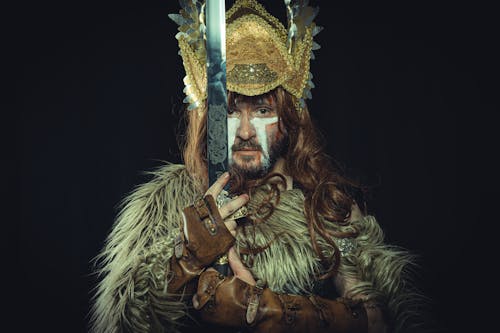 Man in Brown Viking Costume with Sword