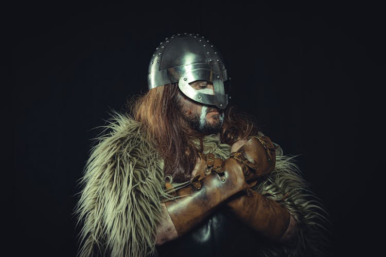 Man In Viking Costume On Black Background