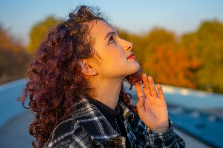 Curly Girl Outdoors On Sunset