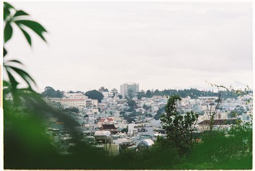 Free A serene overview of Pleiku city, capturing its urban landscape from an elevated angle. Stock Photo