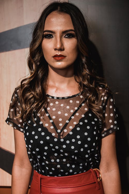 Photography of a Woman Wearing Polka-dot Shirt