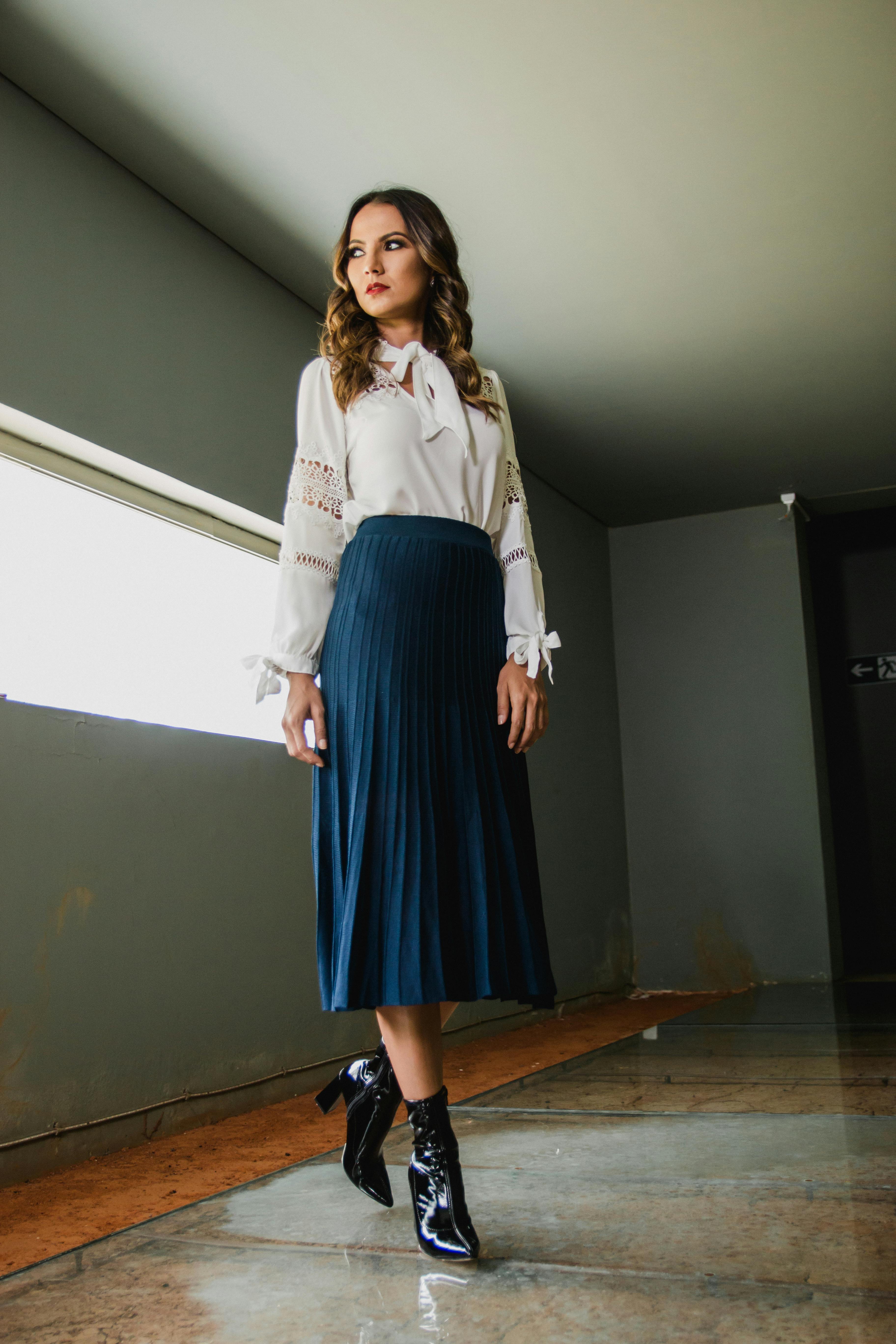 white shirt with blue skirt