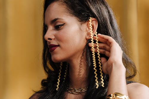 Beautiful Woman Showing Jewelry on her Ear