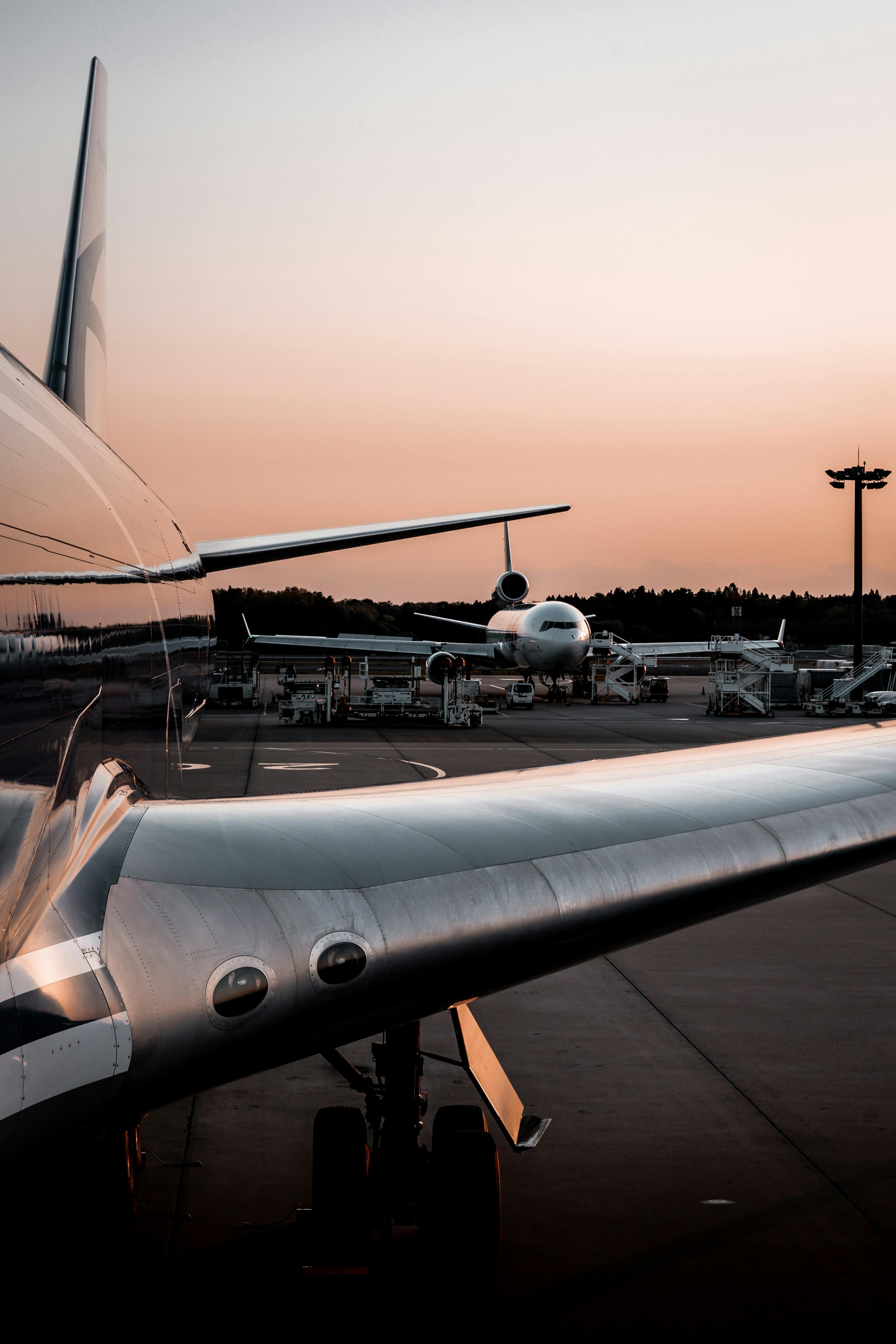Airport tarmac with commercial airplanes for adult pilot career change guide