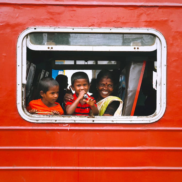 Mother With Children On A Train