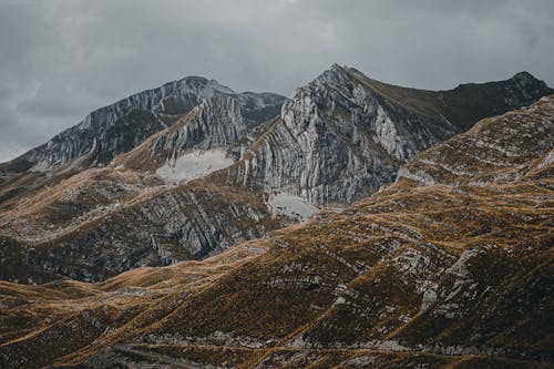 Foto d'estoc gratuïta de a l'aire lliure, alps, cel gris