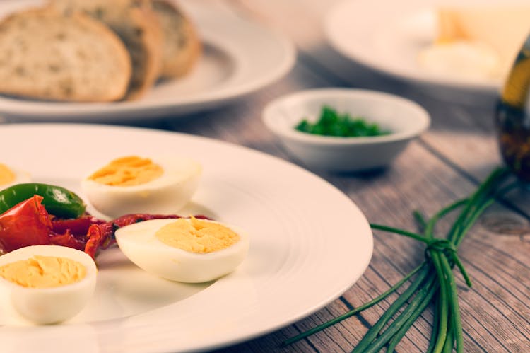 Slices Of Hard Boiled Egg On Plate