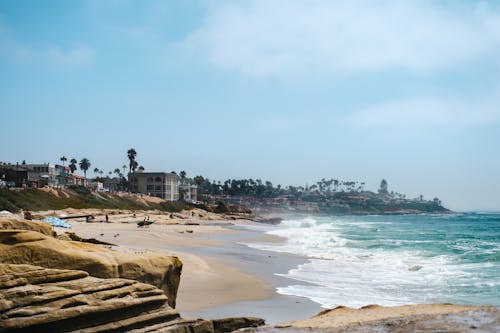 A Beach Waves Crashing on Shore