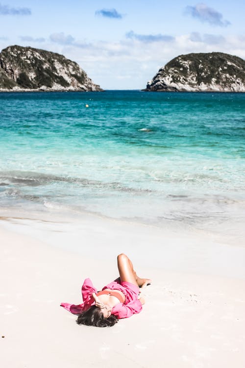 Woman Lying on a Tropical Beach 