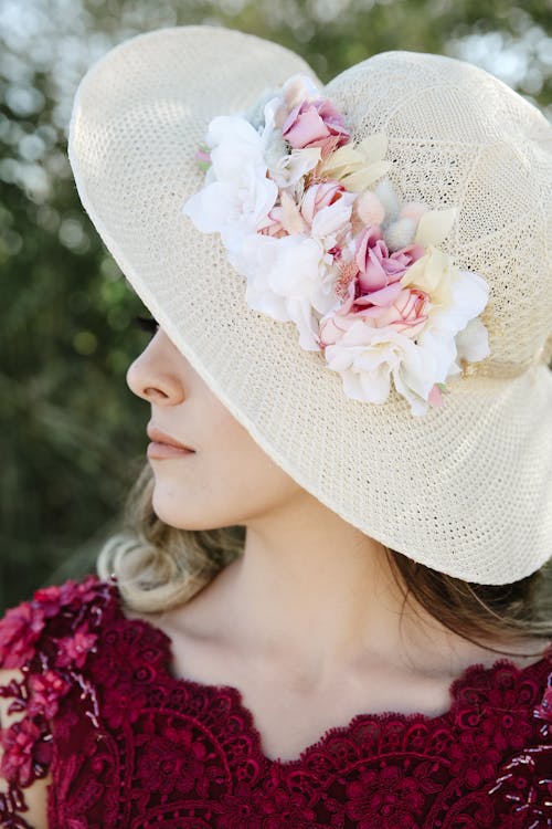 Free Woman in Hat with Flowers Stock Photo