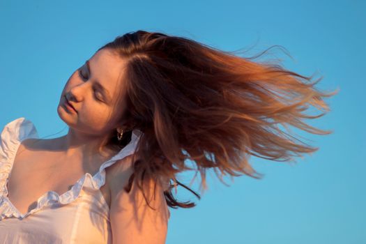 Woman waving her Hair 