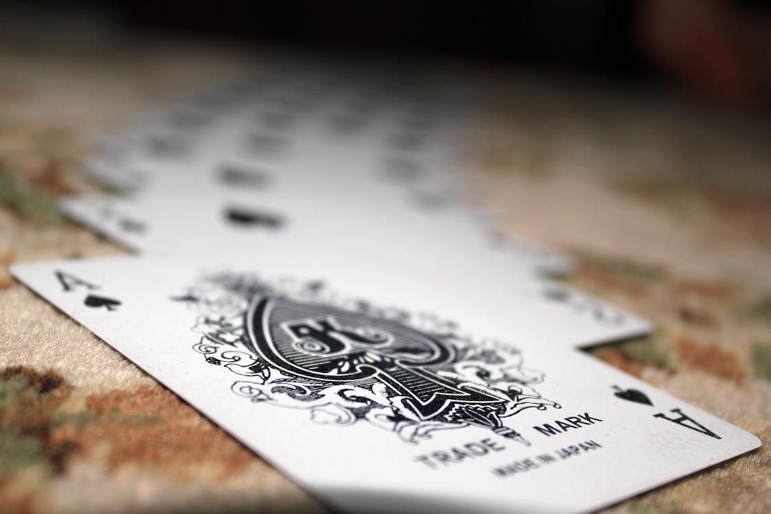 Free Selective Focus Photography of Ace of Spade Playing Card Stock Photo