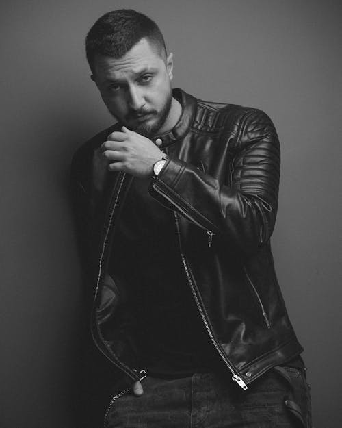 A Man Modeling in a Leather Jacket