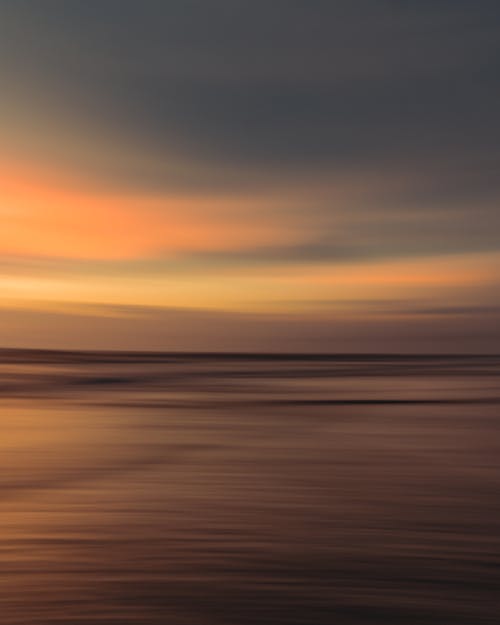 Free A Blurred Photo of a Sunset Stock Photo