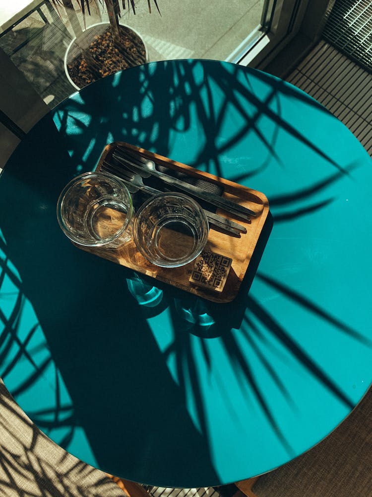 Top View Of Water Glasses On Balcony Table