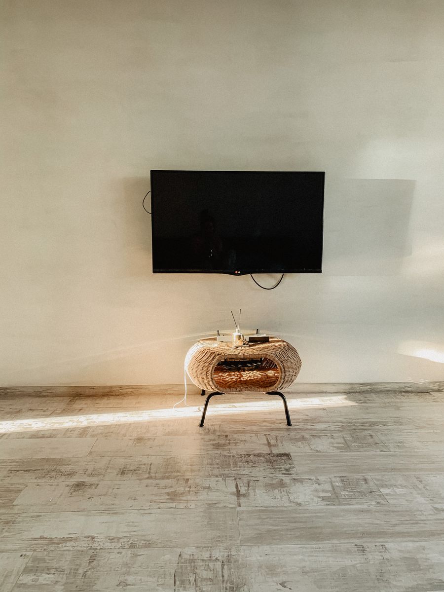 Custom floating TV stand with hidden cable storage