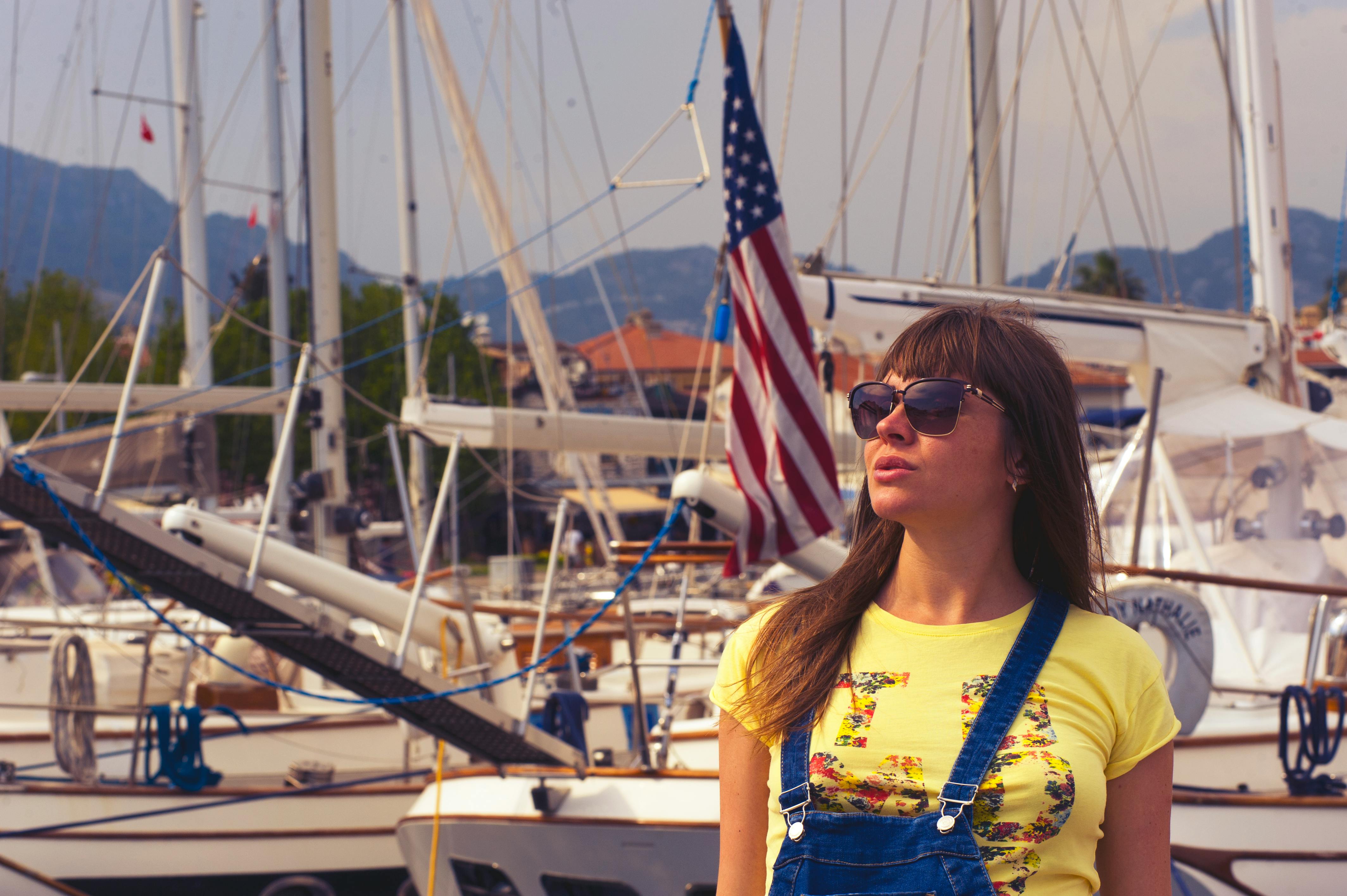 Woman Wearing Sunglasses and Yellow Top