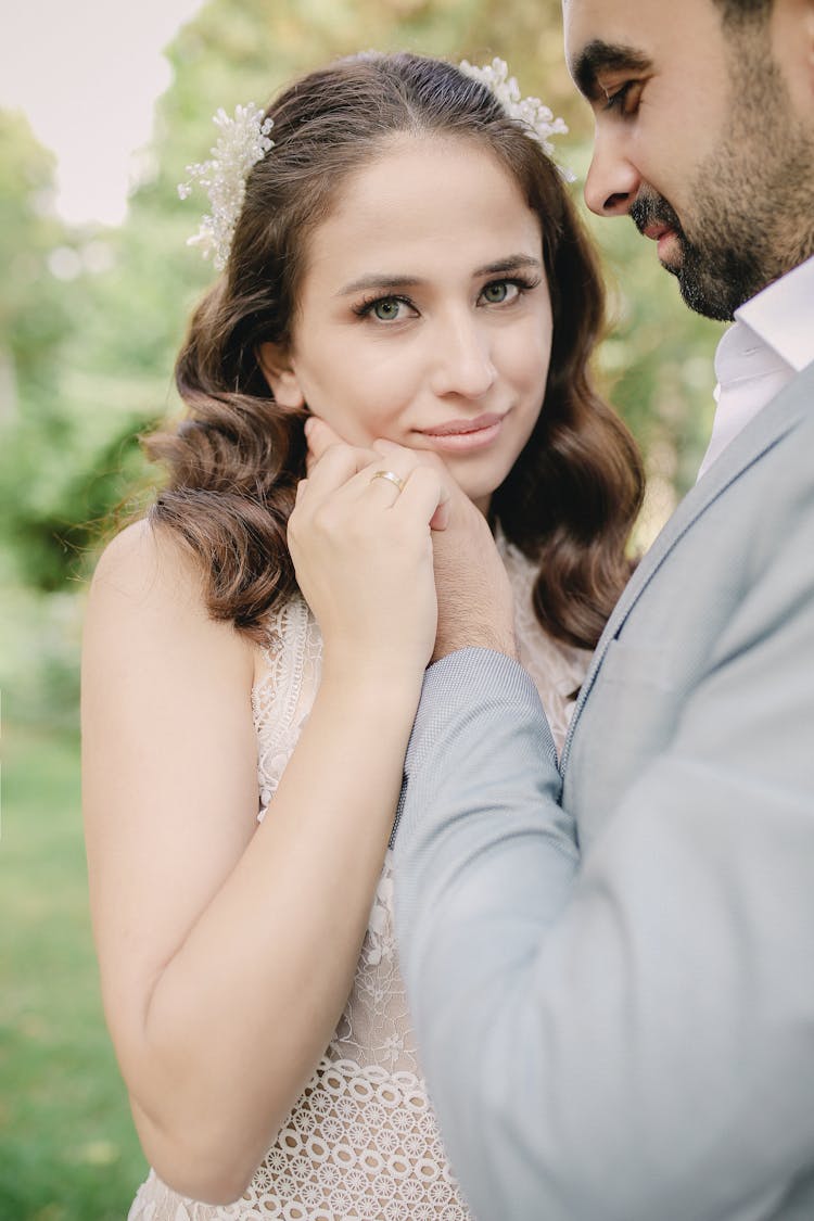 Newlyweds Holding Hands