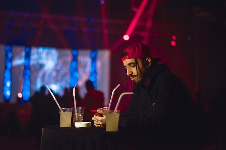 Man Sitting In Club