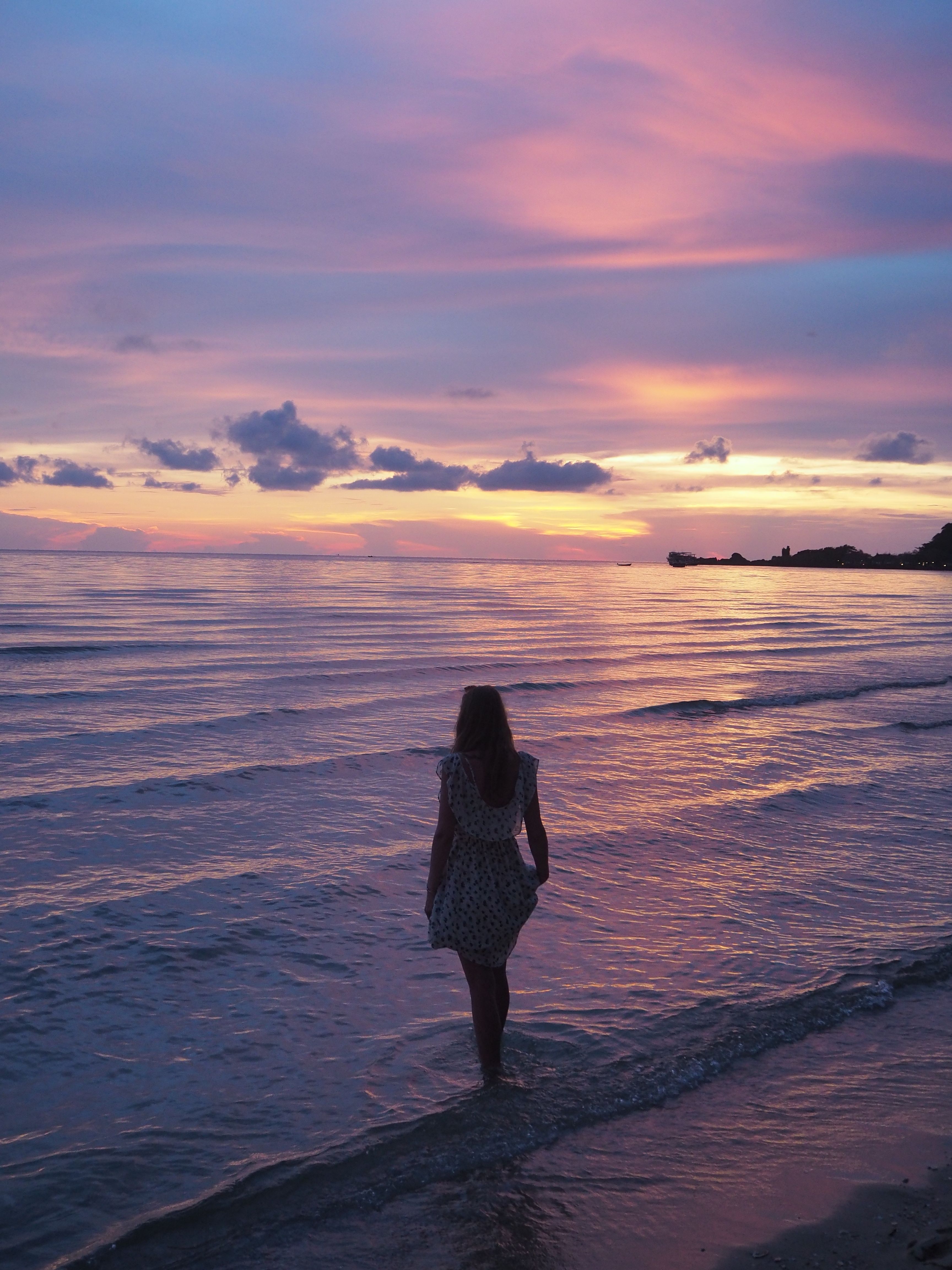 Woman on Sea Shore in Sunset · Free Stock Photo