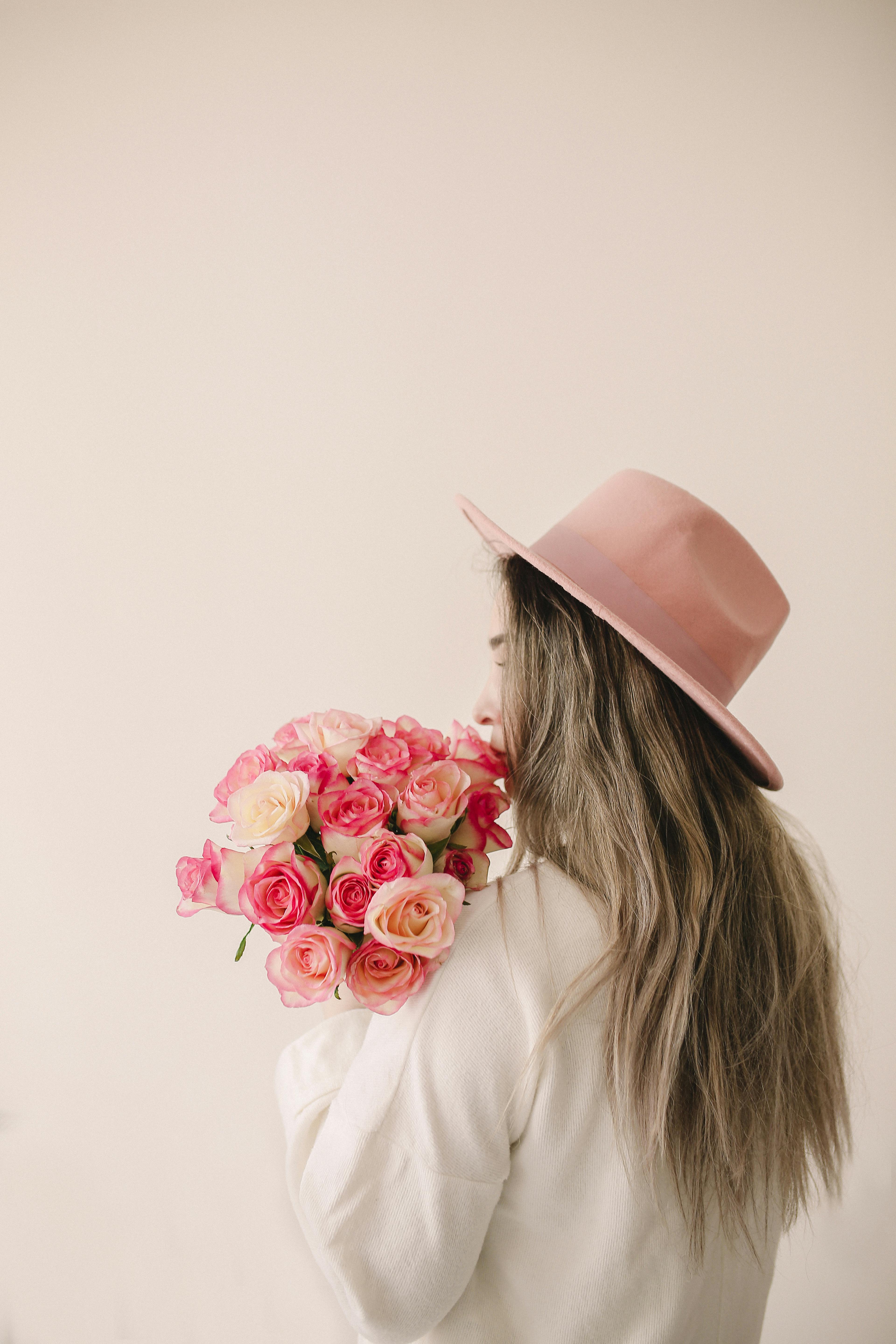 Woman Holding Bouquet of Roses · Free Stock Photo