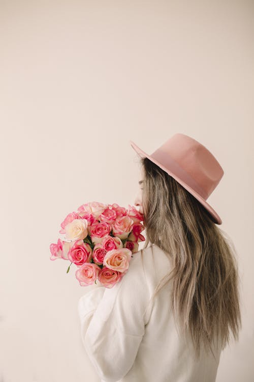 Free Woman Holding Bouquet of Roses Stock Photo