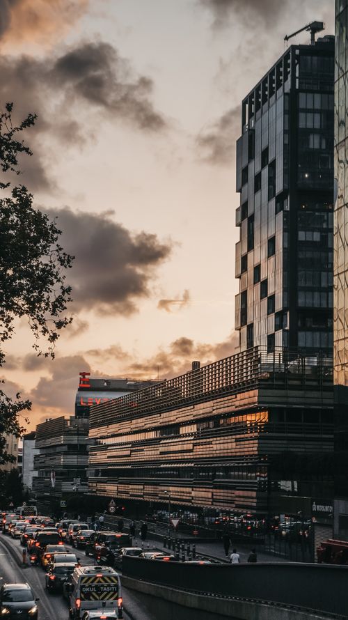 Free Urban cityscape of Istanbul at sunset, showcasing modern architecture and bustling traffic. Stock Photo