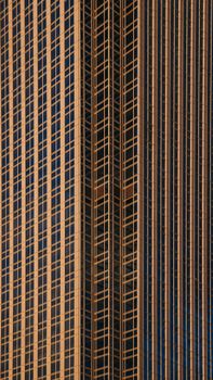 Close-up of a modern skyscraper design in Istanbul with geometric patterns and glass windows.