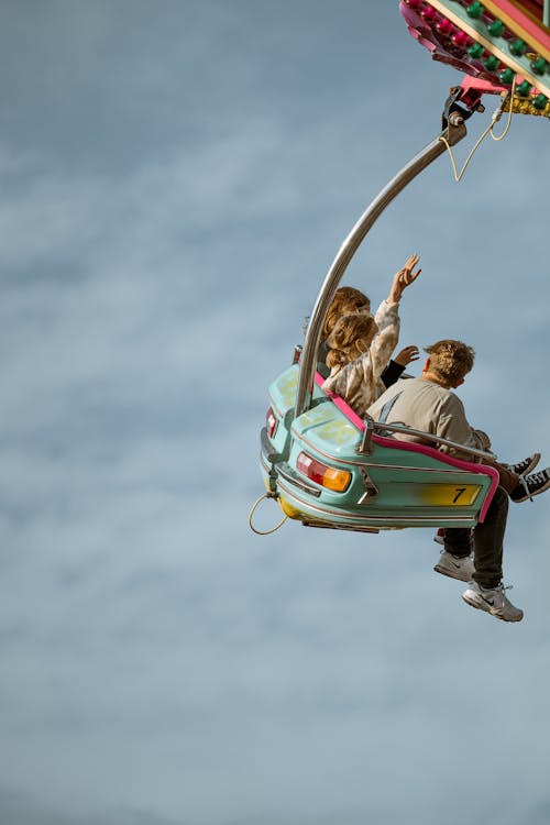 People Riding an Amusement Ride