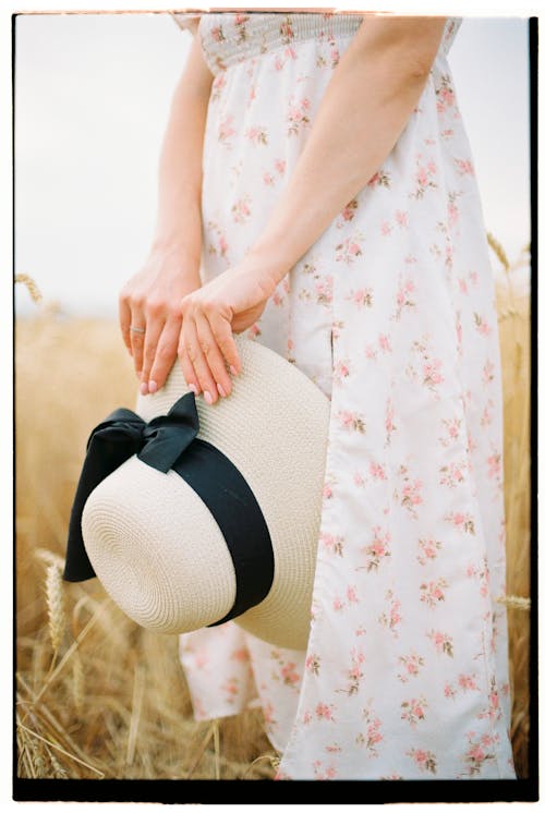 Free Photograph of Womans Hands Holding Hat Stock Photo