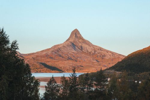 Free Beautiful view of Mount Stetind in Norway during autumn, showcasing a striking geological formation amidst nature. Stock Photo