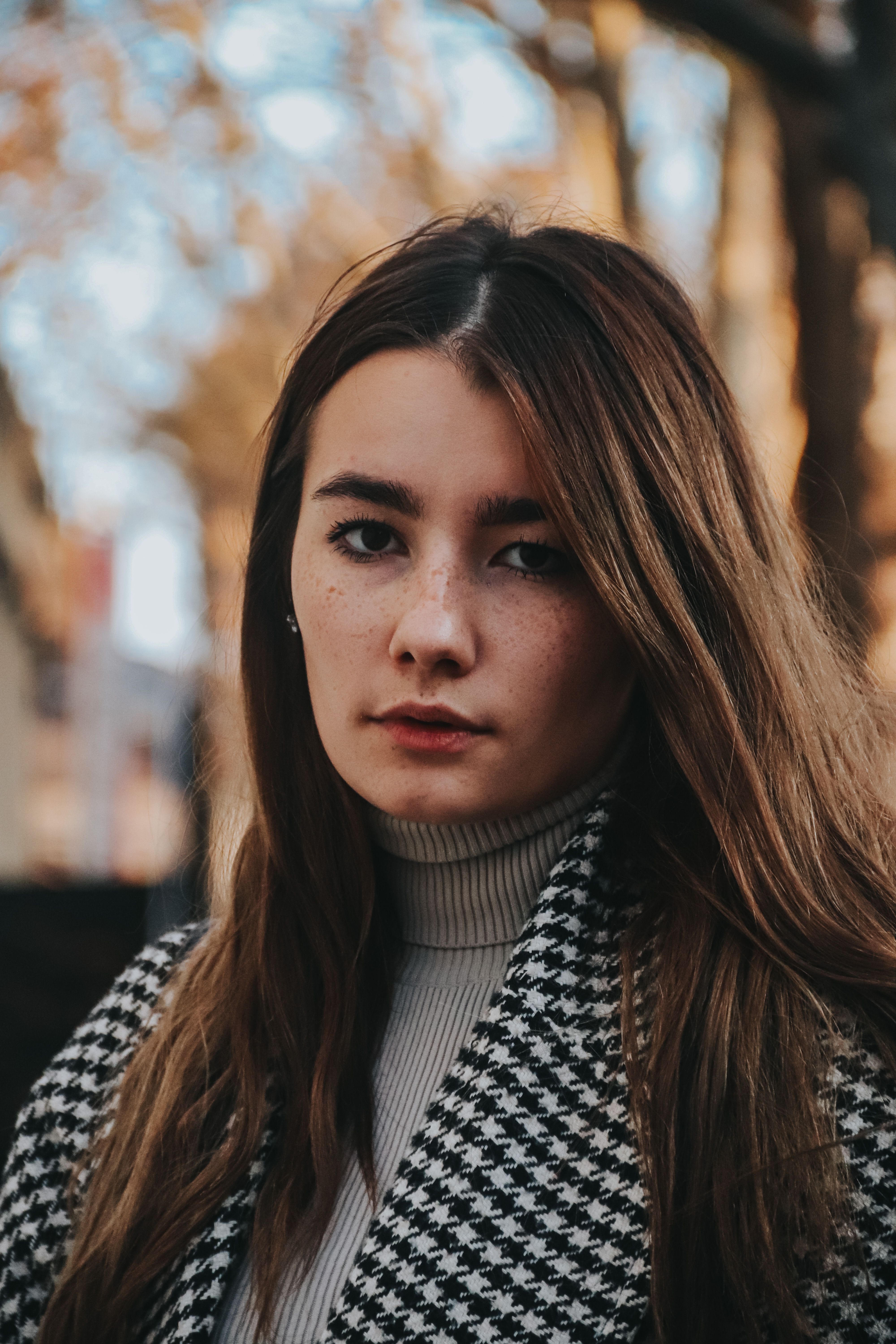 Fashionable woman in warm autumn tones outdoors