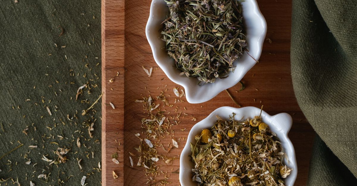 Herbal extract dropper bottle with botanicals