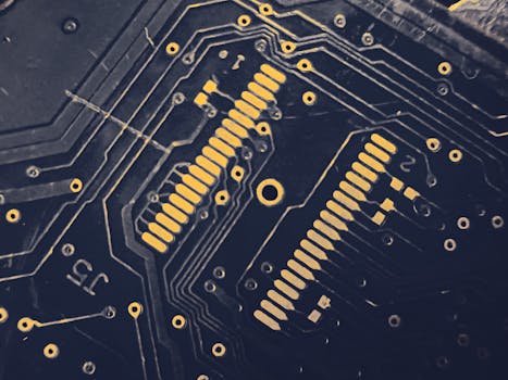 Detailed view of a modern electronic circuit board showing intricate pathways and components.