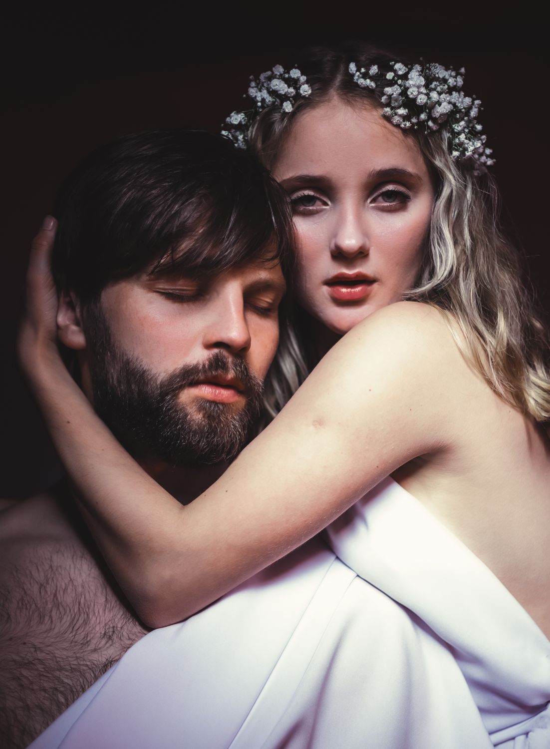 Couple in Intimate Pose · Free Stock Photo