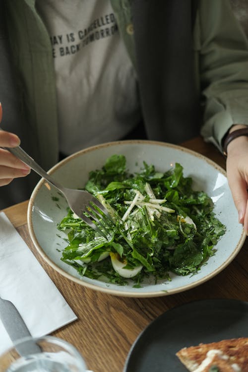 Man Eating Green Salad