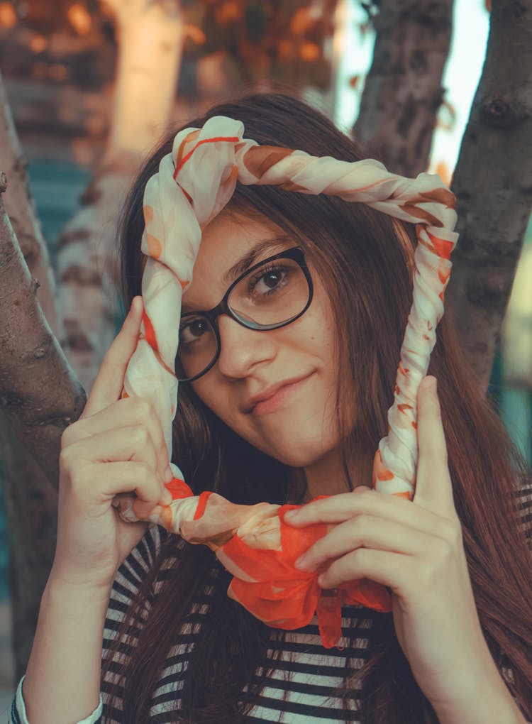 Woman Posing With Face In Frame