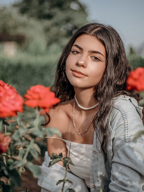 Young Woman among Flowers
