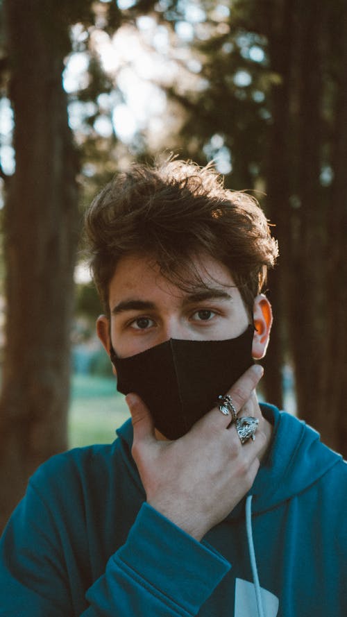 Young Man in Face Mask